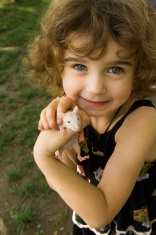1684641-little-girl-with-mouse.jpg